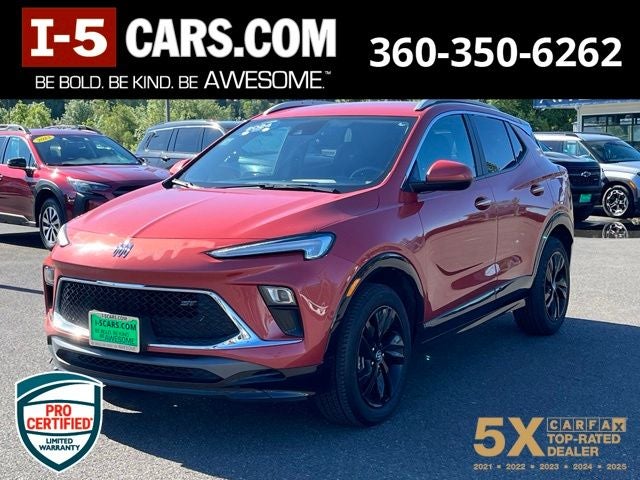 2024 Buick Encore GX Sport Touring in Sunrise Red Metallic — front three-quarter view