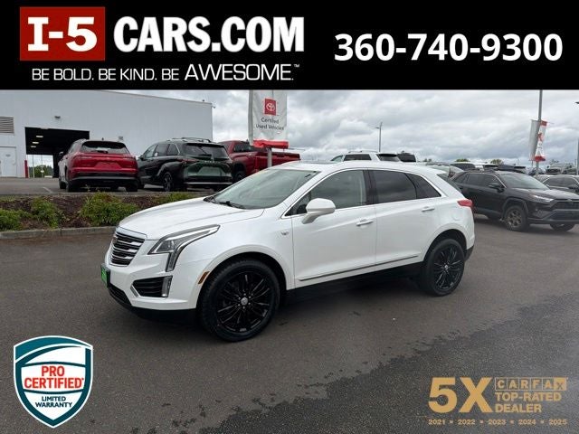 2019 Cadillac XT5 Luxury in Crystal White Tricoat — front three-quarter view