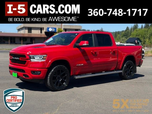 2022 RAM 1500 Laramie in Flame Red — front three-quarter view