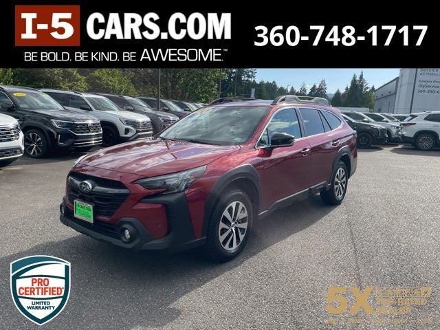 2023 Subaru Outback Premium in Crimson Red Pearl — front three-quarter view